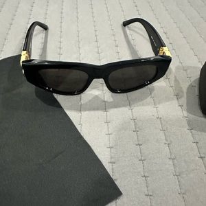 Black and gold Balenciaga cat eye sunglasses. No scratches